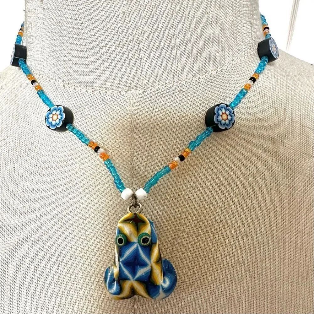 Beaded blue frog pendant necklace